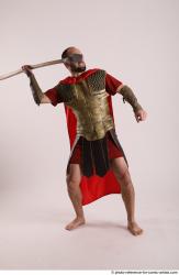 Man Adult Average White Fighting with spear Standing poses Casual